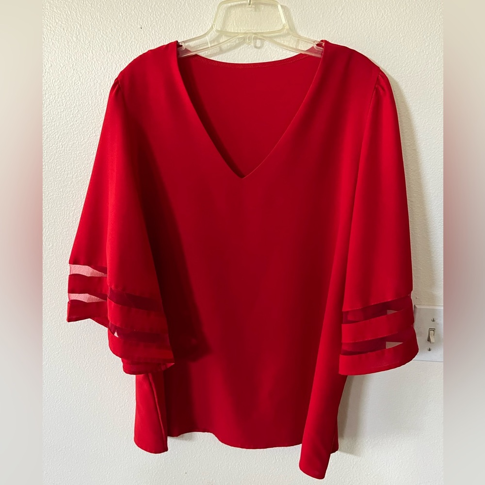 Beautiful red blouse with bell sleeves. Size XXL.